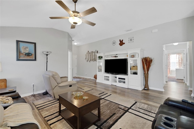 living room featuring wood-type flooring, ceiling fan, and lofted ceiling