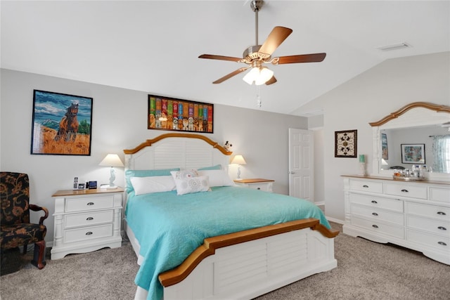 carpeted bedroom featuring ceiling fan and lofted ceiling