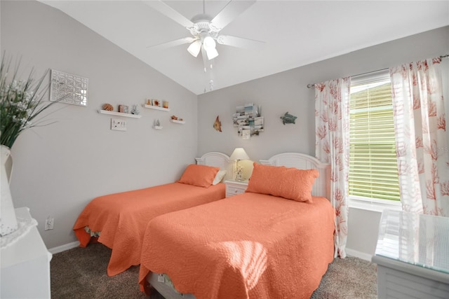 carpeted bedroom featuring ceiling fan, vaulted ceiling, and multiple windows