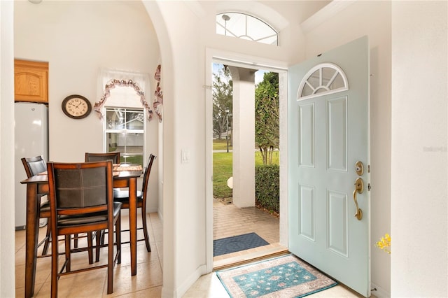 foyer with light tile patterned flooring