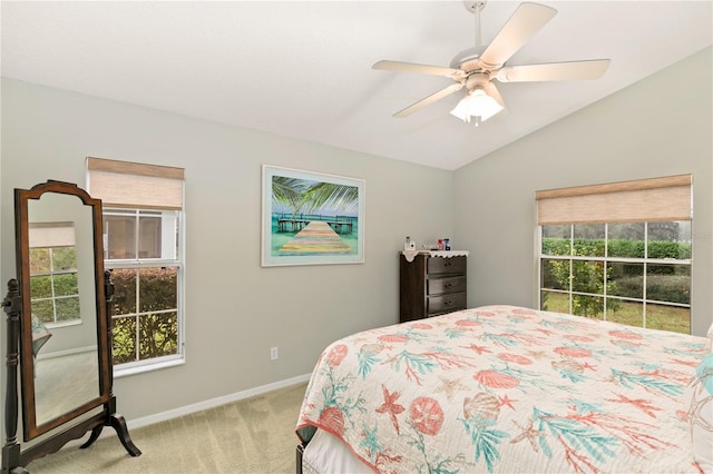 carpeted bedroom featuring ceiling fan and lofted ceiling