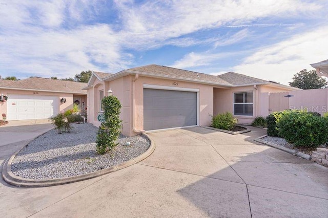 single story home with a garage