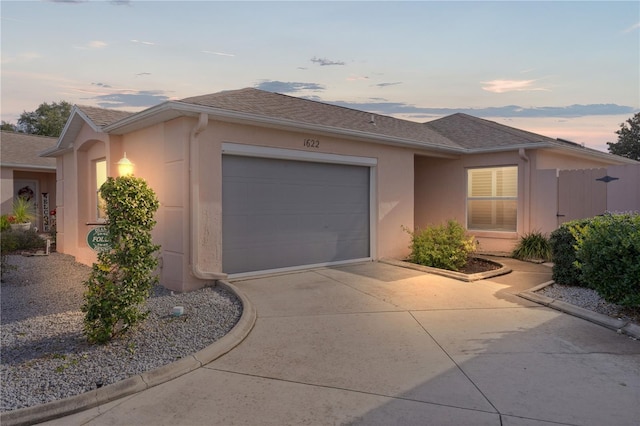 view of front of home with a garage