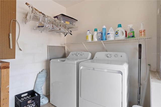 laundry room featuring washer and dryer