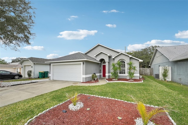 view of front of property with a front yard, a garage, and cooling unit