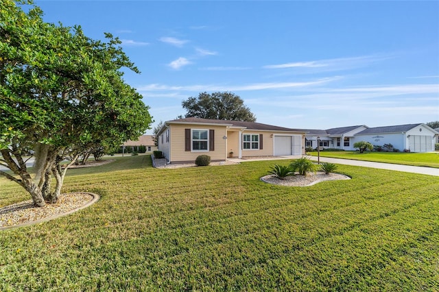 single story home featuring a front yard and a garage