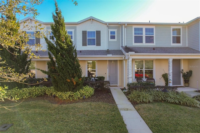 view of property featuring a front yard