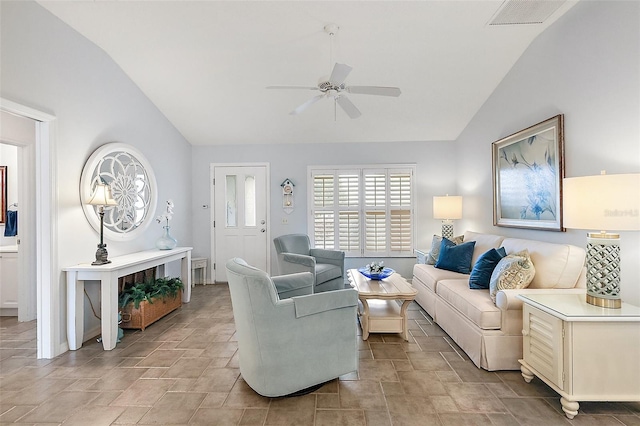 living room featuring ceiling fan and lofted ceiling