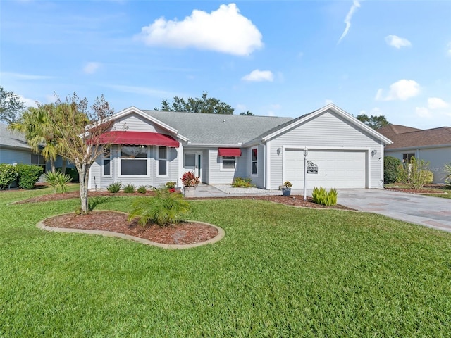 ranch-style home with a front lawn and a garage