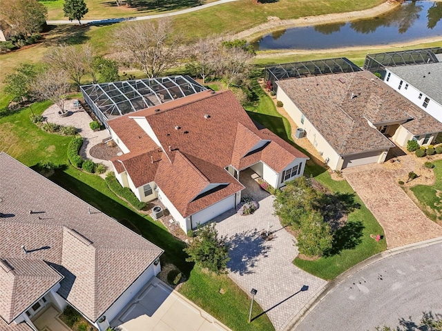 drone / aerial view with a water view