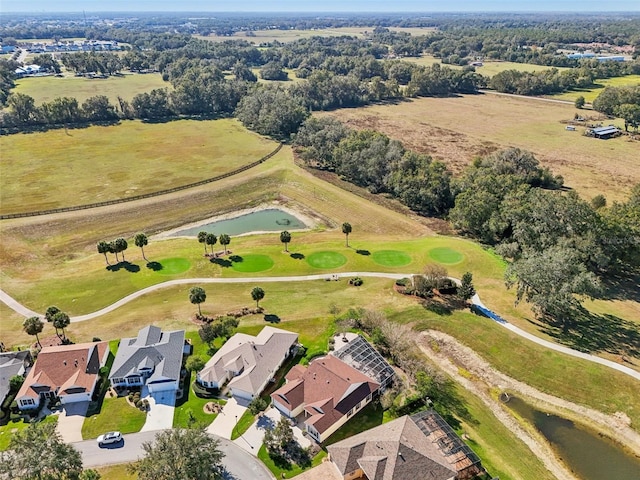 bird's eye view with a residential view and golf course view