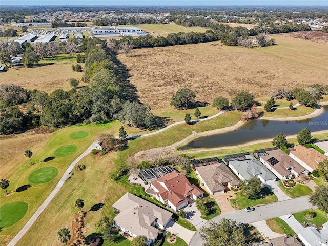 aerial view featuring a residential view and golf course view