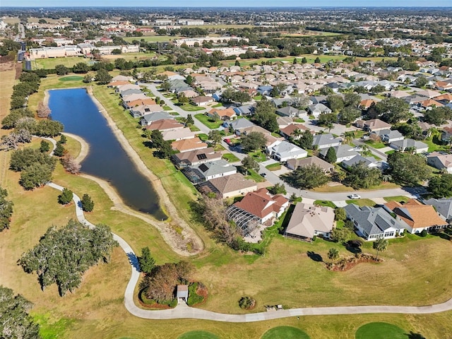 aerial view with a water view and a residential view