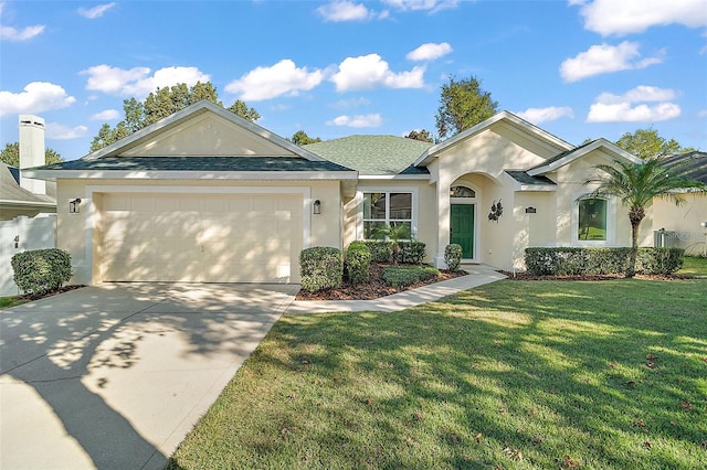 single story home with a front lawn and a garage