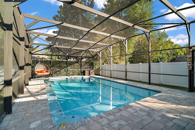 view of pool featuring a lanai and a patio area