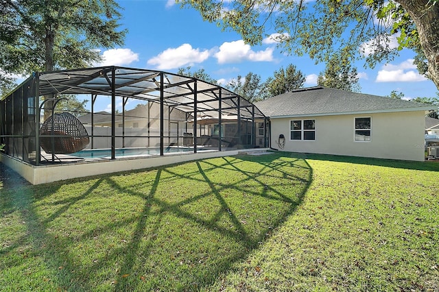 view of yard featuring glass enclosure