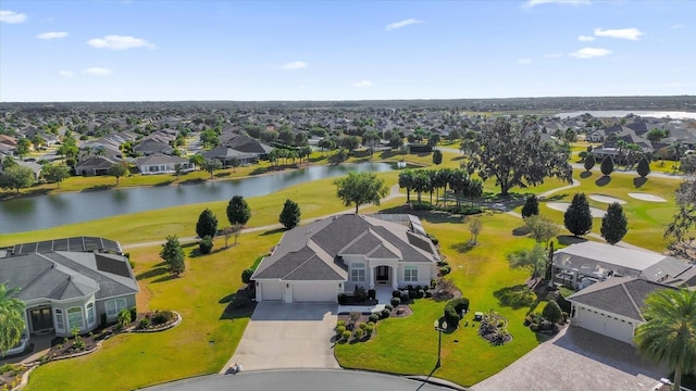 bird's eye view with a water view