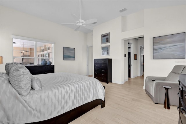 bedroom featuring ceiling fan and light hardwood / wood-style flooring