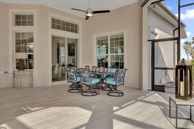 exterior space with ceiling fan