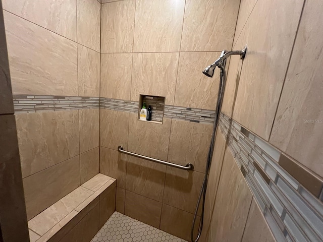 bathroom featuring tiled shower