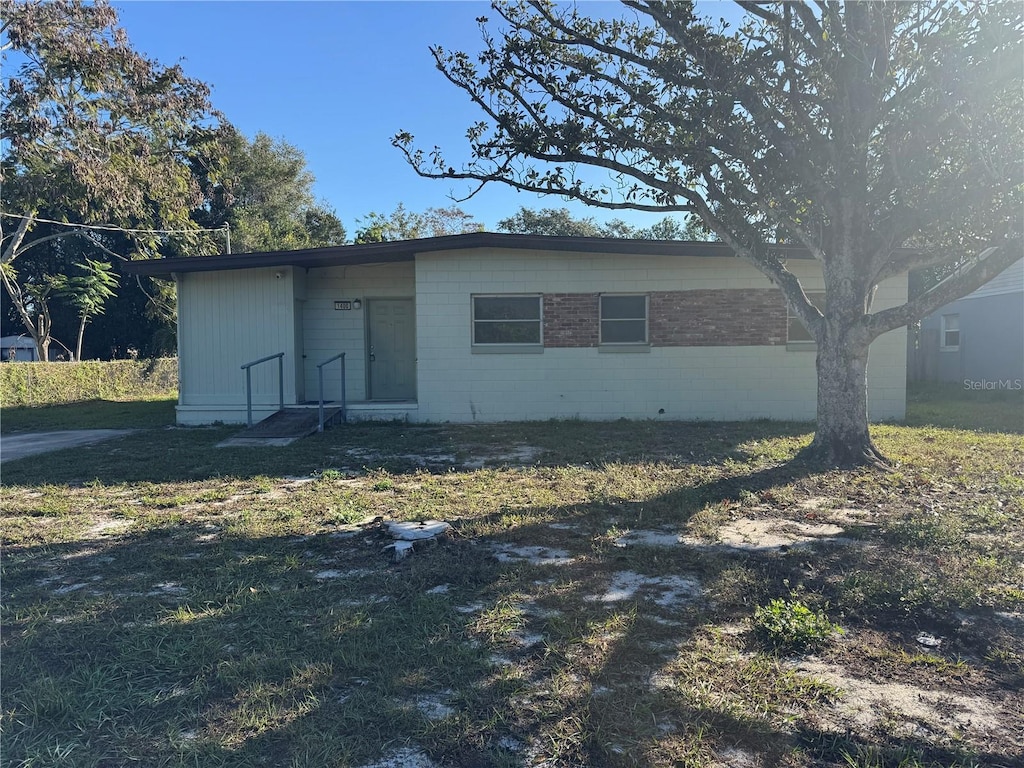 exterior space with a front yard