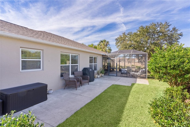 view of patio featuring glass enclosure and a grill