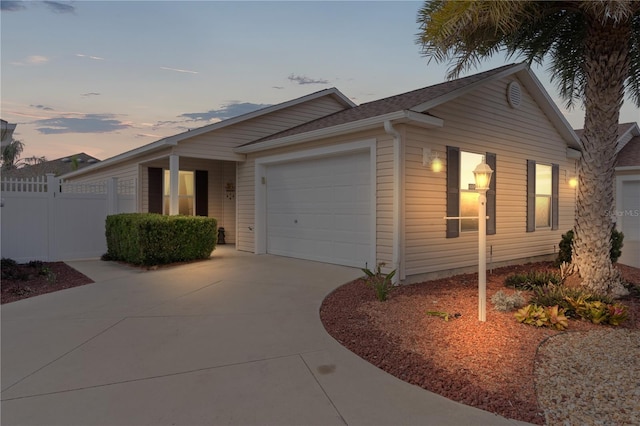 ranch-style home with a garage