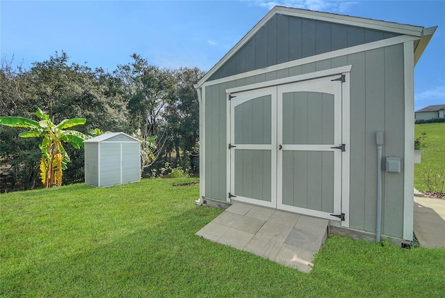 view of outdoor structure with a yard