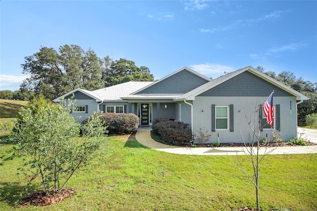 view of front of home with a front yard