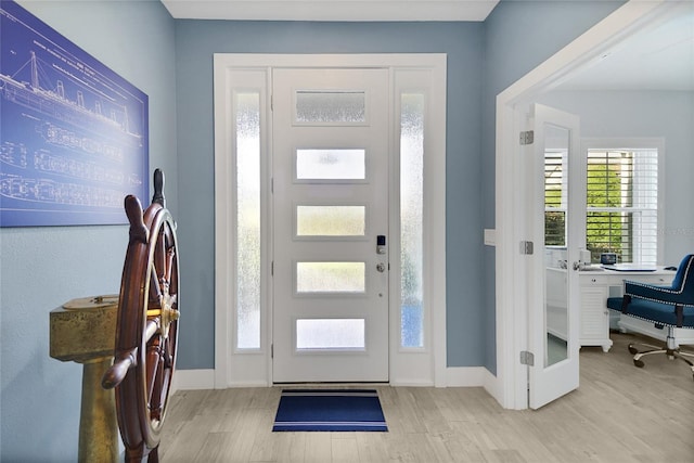 entrance foyer with light wood-type flooring