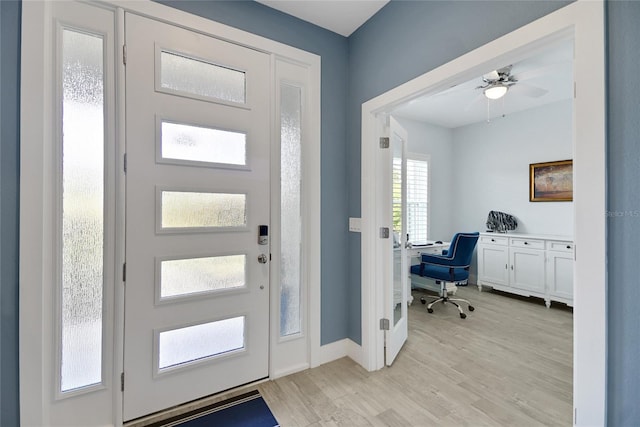 entrance foyer with light wood-type flooring and ceiling fan