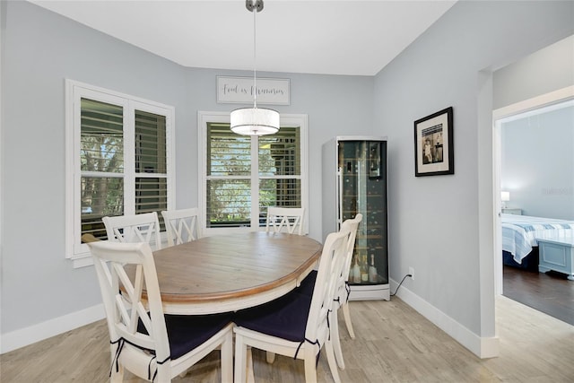 dining area with light wood-type flooring