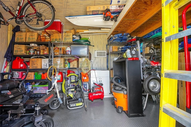 garage with wood walls