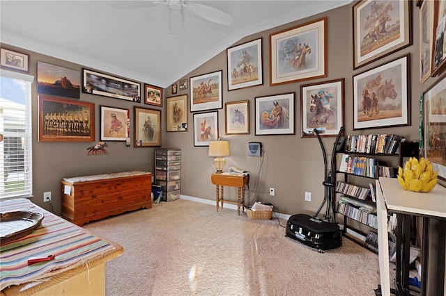 living area with light colored carpet, vaulted ceiling, ceiling fan, and crown molding