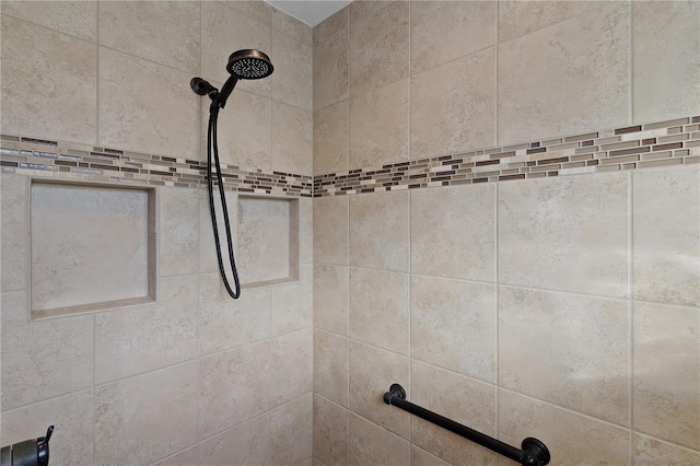 details featuring tiled shower