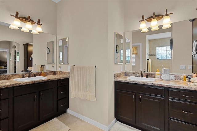 bathroom featuring tile patterned floors and vanity