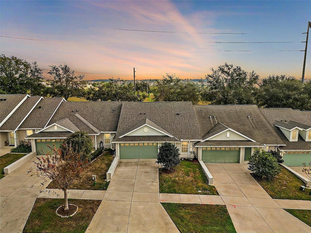 single story home with a garage