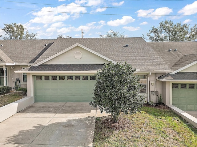 single story home with a garage