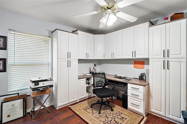 office space featuring ceiling fan and dark hardwood / wood-style floors