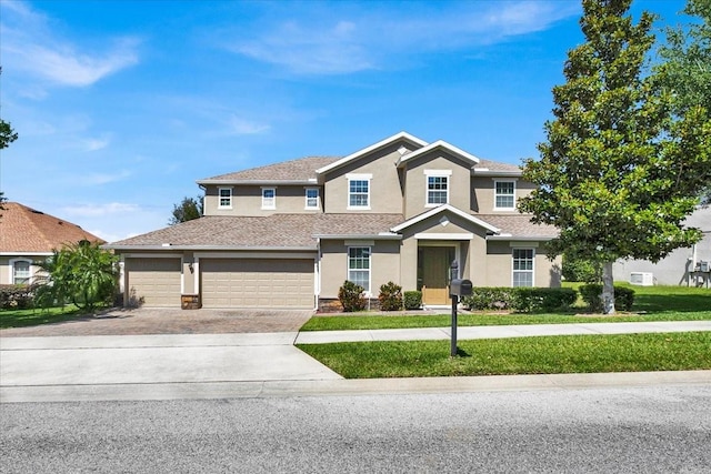 view of front of house with a garage