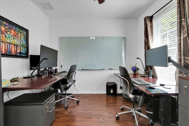 office with dark wood-type flooring