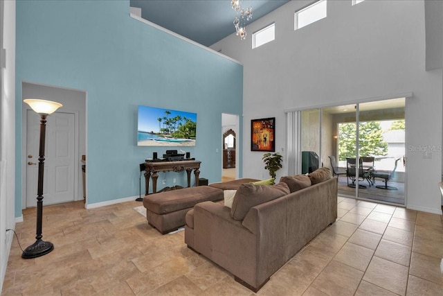 living room featuring a towering ceiling