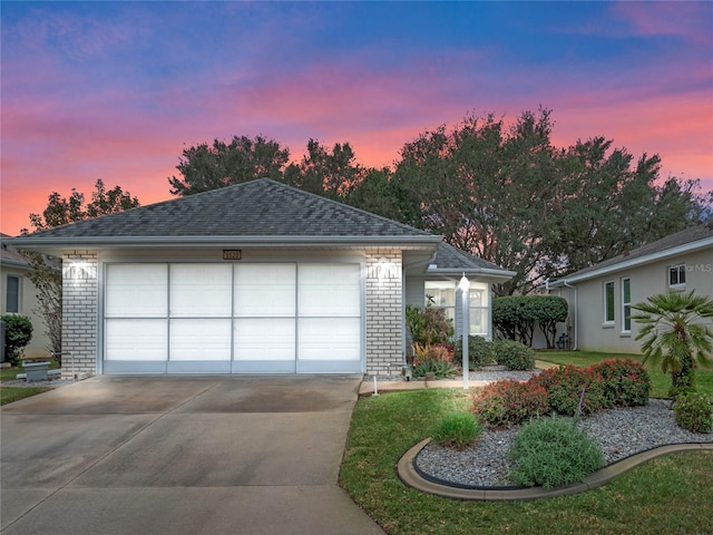 single story home with a garage