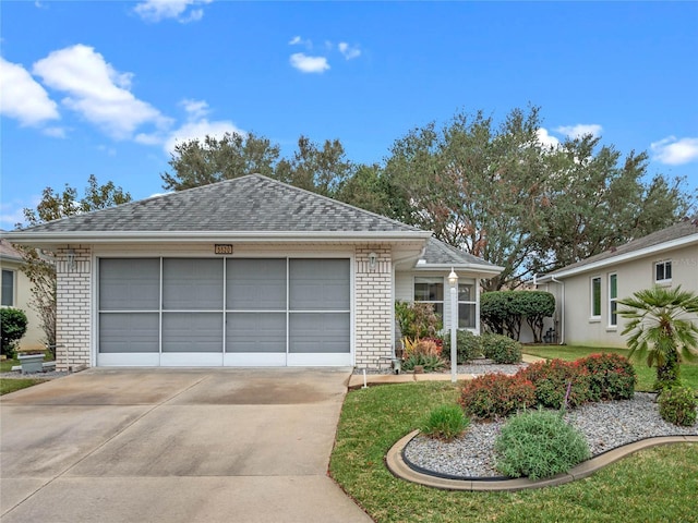 single story home featuring a garage