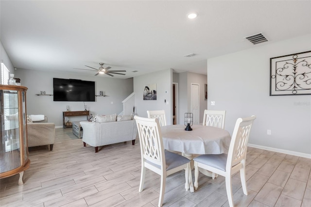 dining area with ceiling fan