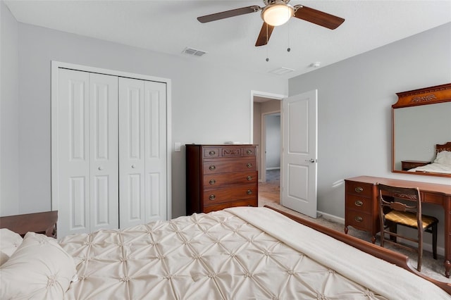 bedroom featuring a closet and ceiling fan