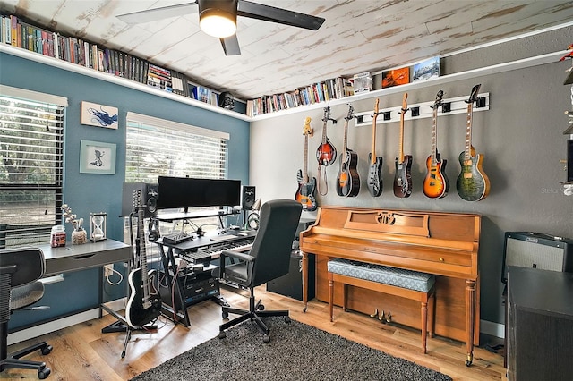 office space featuring ceiling fan and wood-type flooring