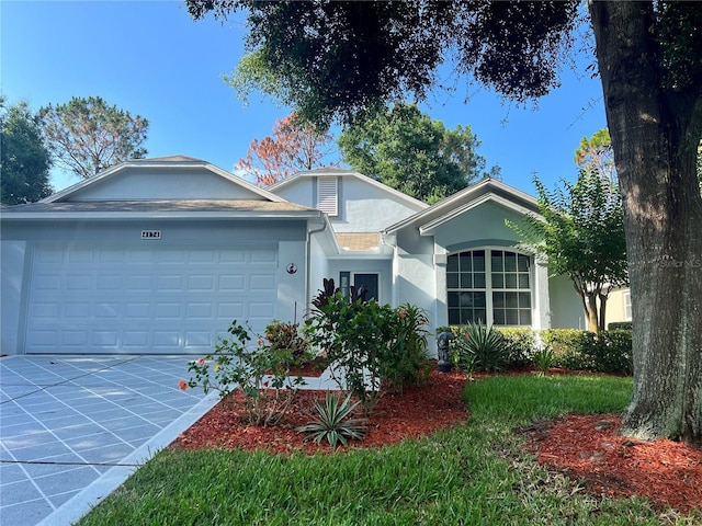 view of front of property featuring a garage