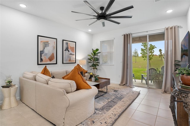 tiled living room featuring ceiling fan