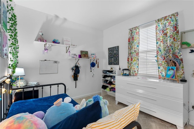 bedroom featuring carpet